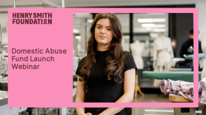 Webinar cover image showing a pink box around a woman smiling into the camera and a dark red Henry Smith Foundation Logo in the top left. Text reads: Domestic Abuse Fund Launch Webinar.